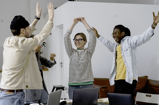 employees celebrating their sales