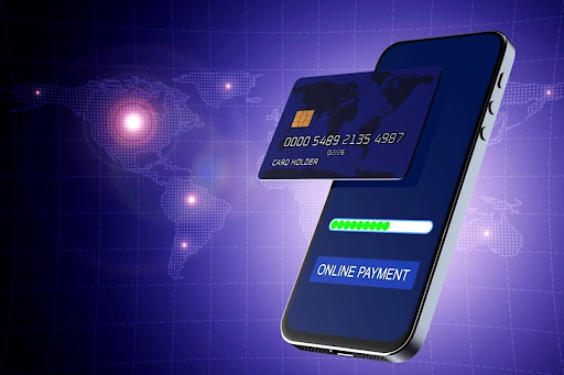 An iphone and a credit card displaying the ease of setting up digital payments.