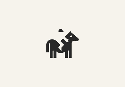 you'll see a jockey (the object as the negative space) and a horse (the object as a positive space)